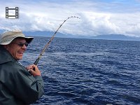 My dad catches the largest King Salmon of the day. Chinook.